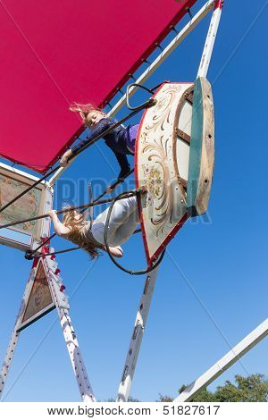Nieuwehorne, The Netherlands - Sep 28: Fair With Two Unknown Girls At A Wooden Swing During The Agri
