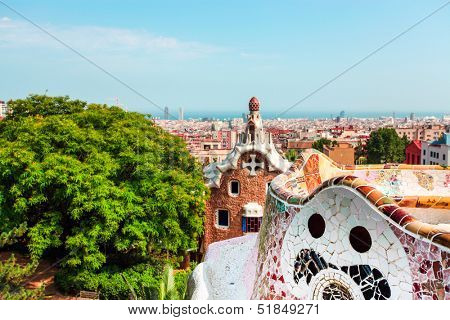 BARCELONA, SPAIN - JULY 19: Ceramic mosaic Park Guell on July 19, 2013 in Barcelona, Spain. Park Guell is the famous architectural town art designed by Antoni Gaudi and built in the years 1900 to 1914