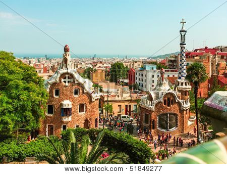 BARCELONA, SPAIN - JULY 19: Ceramic mosaic Park Guell on July 19, 2013 in Barcelona, Spain. Park Guell is the famous architectural town art designed by Antoni Gaudi and built in the years 1900 to 1914