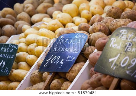 Patatoes Lined On A Counter Of Open Market