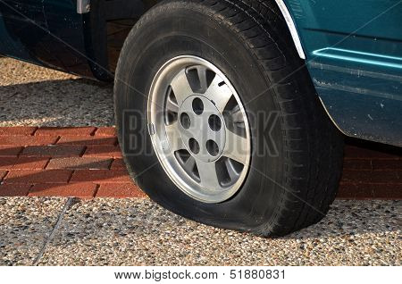 flat tire on automobile