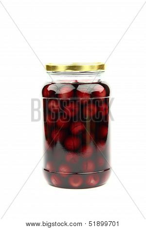 Compote with cherries in jars