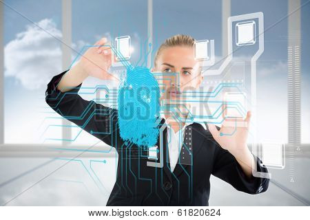 Digital composite of blonde businesswoman touching interface with fingerprint