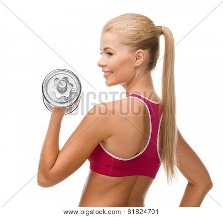 fintess, healthcare and dieting concept - young sporty woman with heavy steel dumbbell