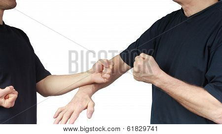 Two people are doing techniques Wing Chun