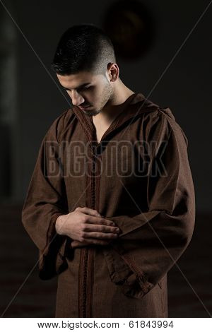 Young Muslim Guy Praying