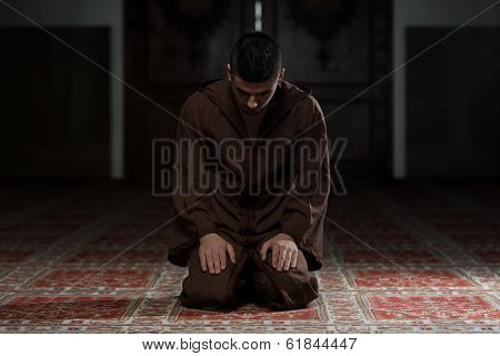 Young Muslim Guy Praying