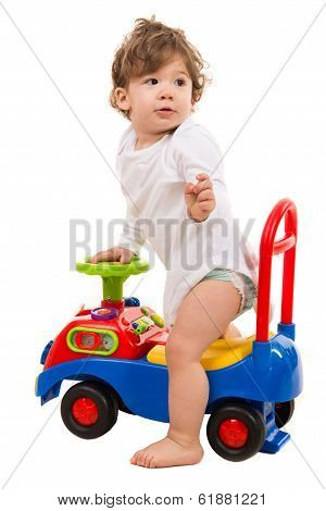 Boy In A Car Toy Looking Back