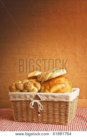 Delicious Bread And Rolls In Wicker Basket