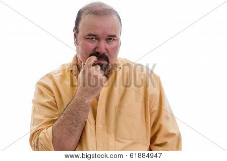 Thoughtful Man Chewing His Finger As He Debates