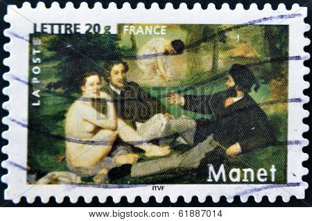 A stamp printed in France shows the painting 