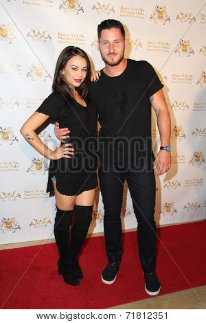 LOS ANGELES - SEP 10:  Janel Parrish, Valentin Chmerkovskiy at the Dance With Me USA Grand Opening at Dance With Me Studio on September 10, 2014 in Sherman Oaks, CA