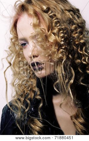 Charisma. Individuality. Young Woman With Curly Hairs