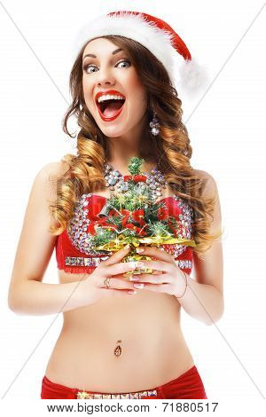 Happy New Year. Playful Gleeful Snow Maiden With Small Christmas Tree