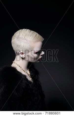 Charisma. Profile Of Blonde Fashion Model With Bob Hairdo