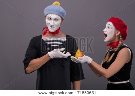 Portrait of funny mime couple with white faces and emotions isol