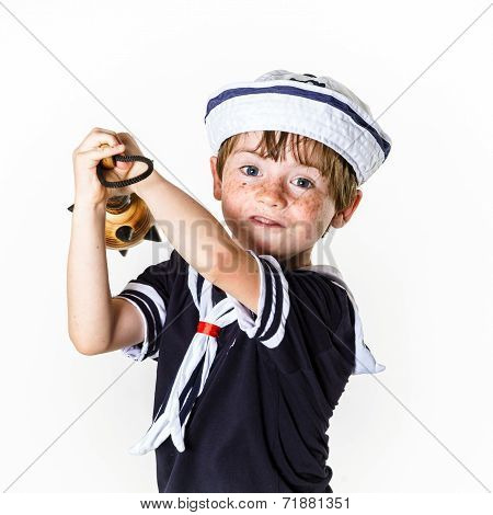 Little Boy Dressed In Sailor Suit