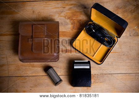 Old Electric Razor On A Wooden Table
