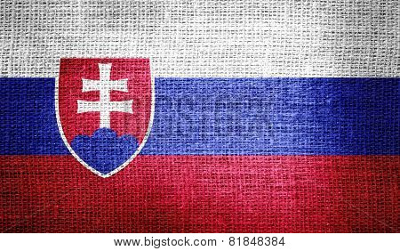 Slovakia flag on burlap fabric