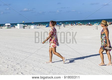 People In Late Afternoon Are Going To Leave The Beach