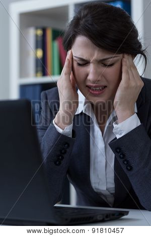 Office Worker With Cephalalgia