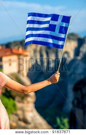 Greek flag on the mountains background