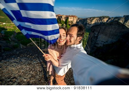 Young couple travelers in Greece