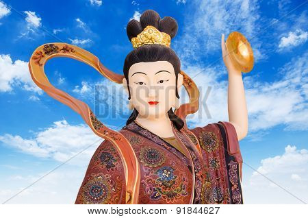 Chinese God On Blue Sky Background In Chinese Tample , Thailand