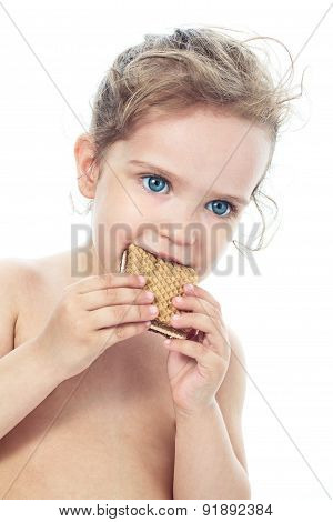 Beautiful Sweet  Little Girl Eating A Cookie
