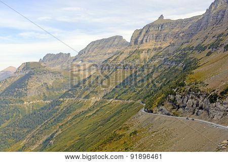Narrow Winding Road Going Up A Mountain Ridge