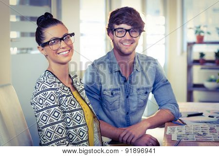Happy designers working together in creative office
