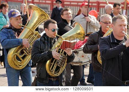 Orel Russia - May 1 2016: Communist party demonstration. Brass band playing and marching closeup