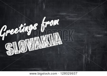 Chalkboard background with chalk letters: Greetings from slovaki