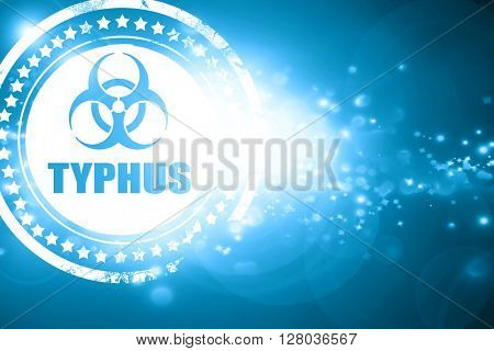 Blue stamp on a glittering background: Typhus concept background