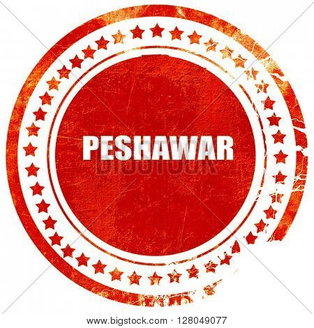 peshawar, grunge red rubber stamp on a solid white background