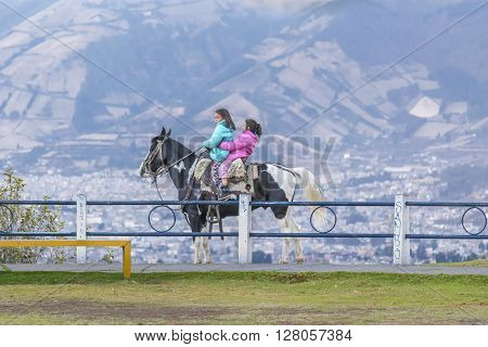 Two Girls Riding A Horse Quito Ecuador