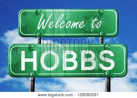 hobbs vintage green road sign with blue sky background