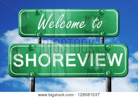 shoreview vintage green road sign with blue sky background