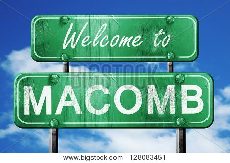 macomb vintage green road sign with blue sky background