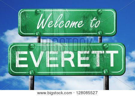 everett vintage green road sign with blue sky background