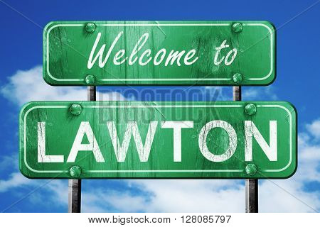 lawton vintage green road sign with blue sky background