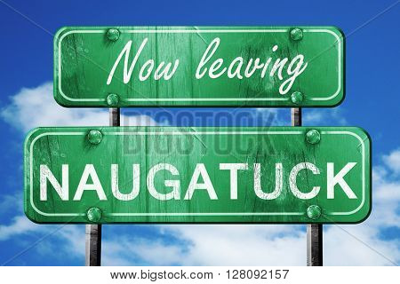 Leaving naugatuck, green vintage road sign with rough lettering