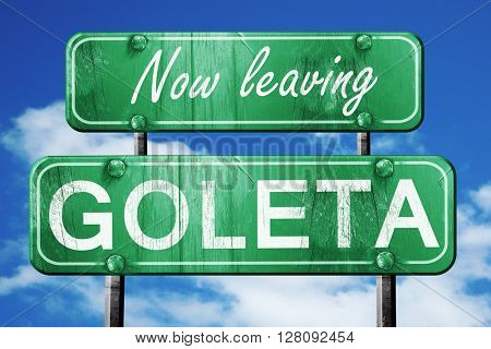 Leaving goleta, green vintage road sign with rough lettering
