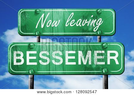 Leaving bessemer, green vintage road sign with rough lettering