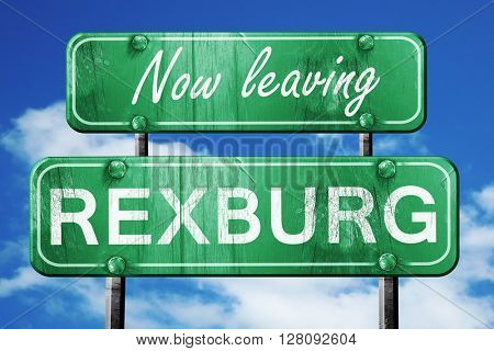 Leaving rexburg, green vintage road sign with rough lettering