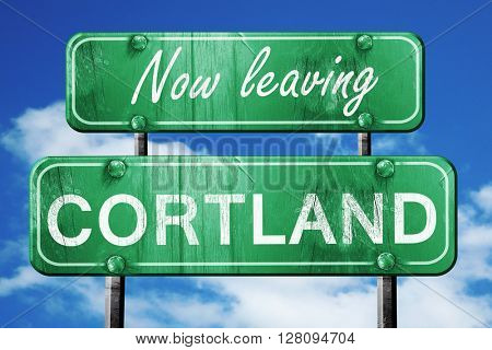 Leaving cortland, green vintage road sign with rough lettering