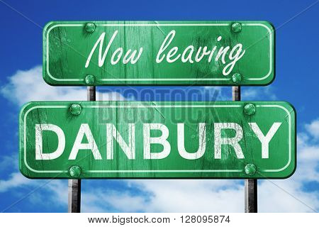 Leaving danbury, green vintage road sign with rough lettering