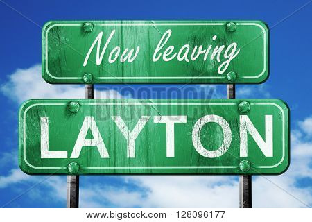 Leaving layton, green vintage road sign with rough lettering