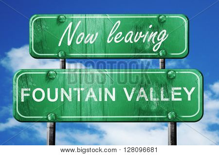 Leaving fountain valley, green vintage road sign with rough lett