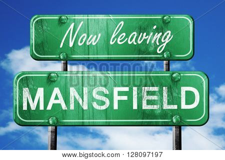 Leaving mansfield, green vintage road sign with rough lettering